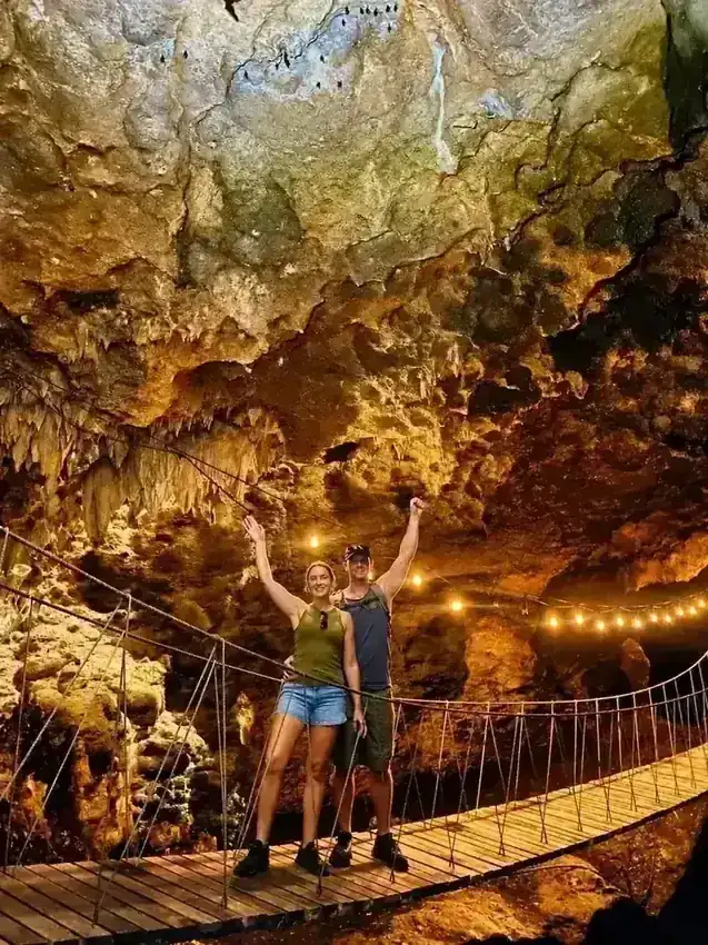 Triumphant Couple on a Cave Bridge at Freshwater Plantation